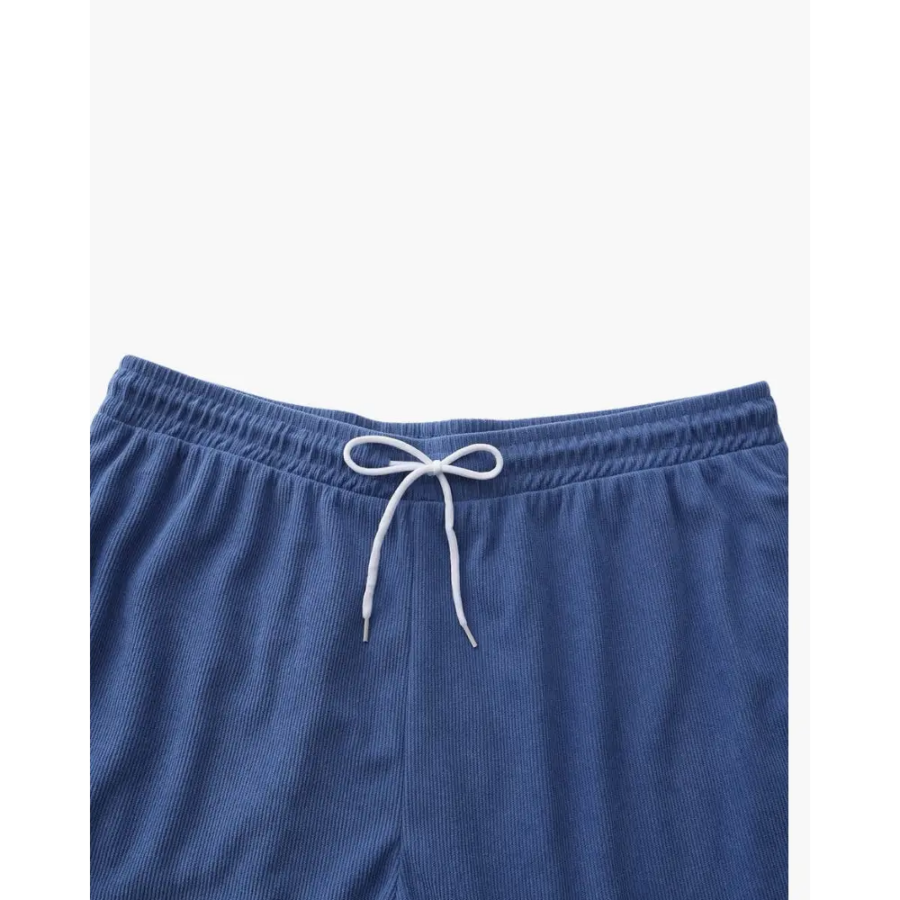Fine-ribbed corduroy shorts rear view showing neutral tone and drape