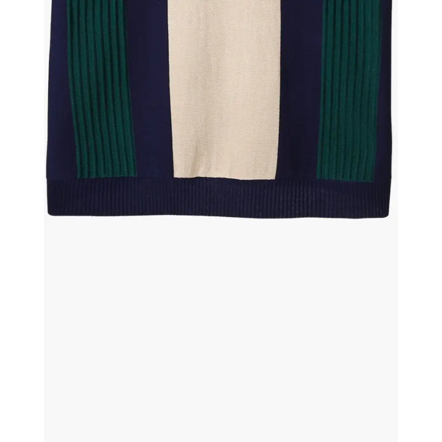 Back view of half-zip polo showing vertical ribbing construction and tailored profile through torso