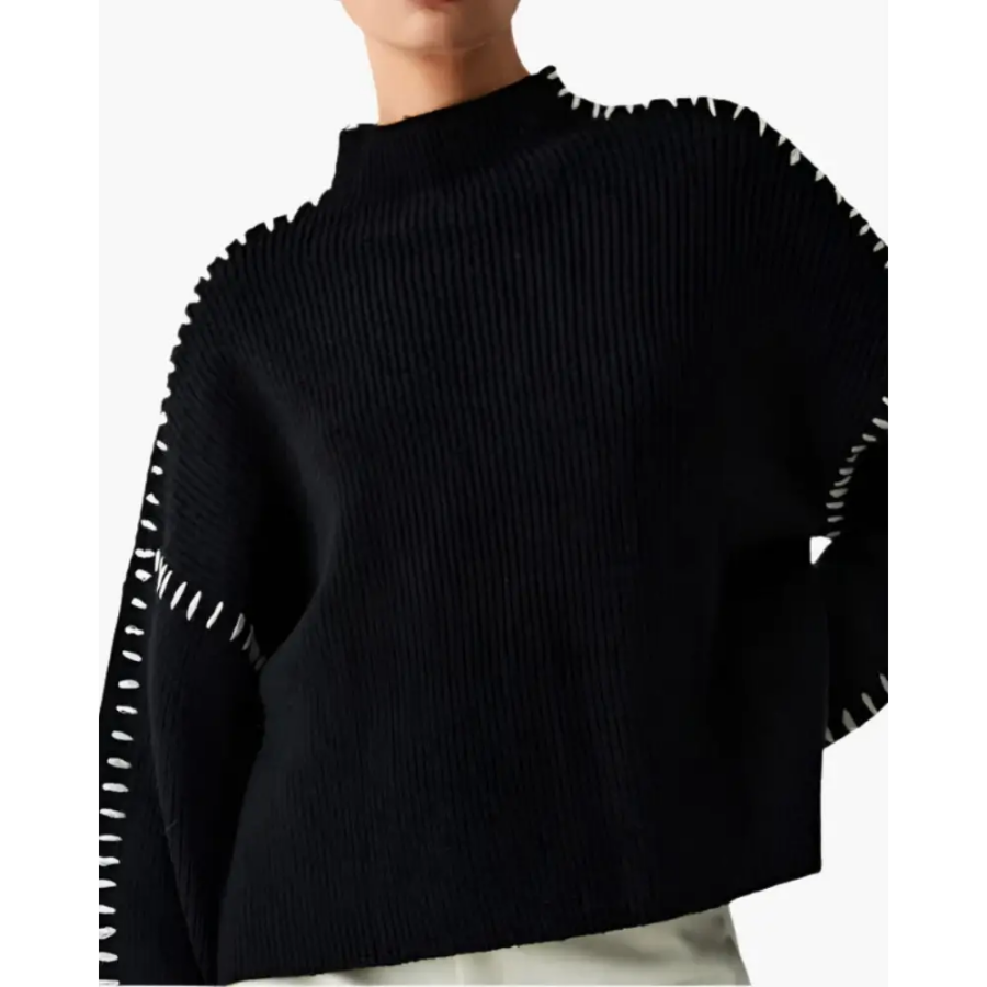 Black knit sweater with white contrast stitching, back view