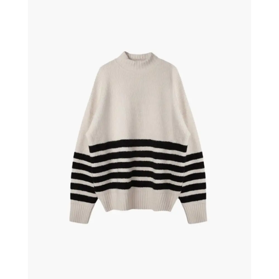 Detail of woven black stripes on cream cotton sweater, flat lay