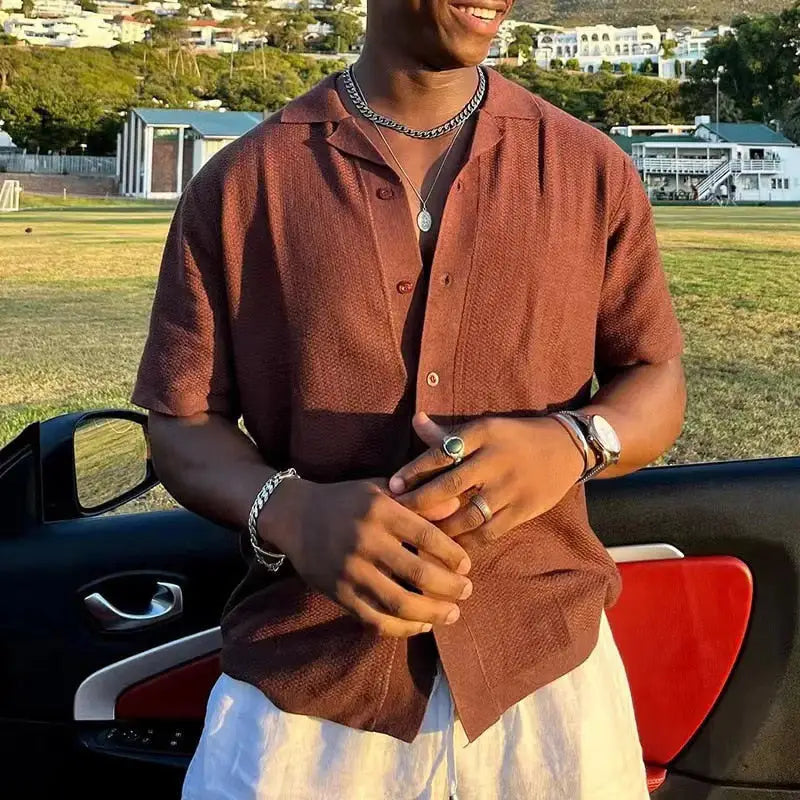 Cuban collar linen shirt worn open, demonstrating breathable fabric and collar drape