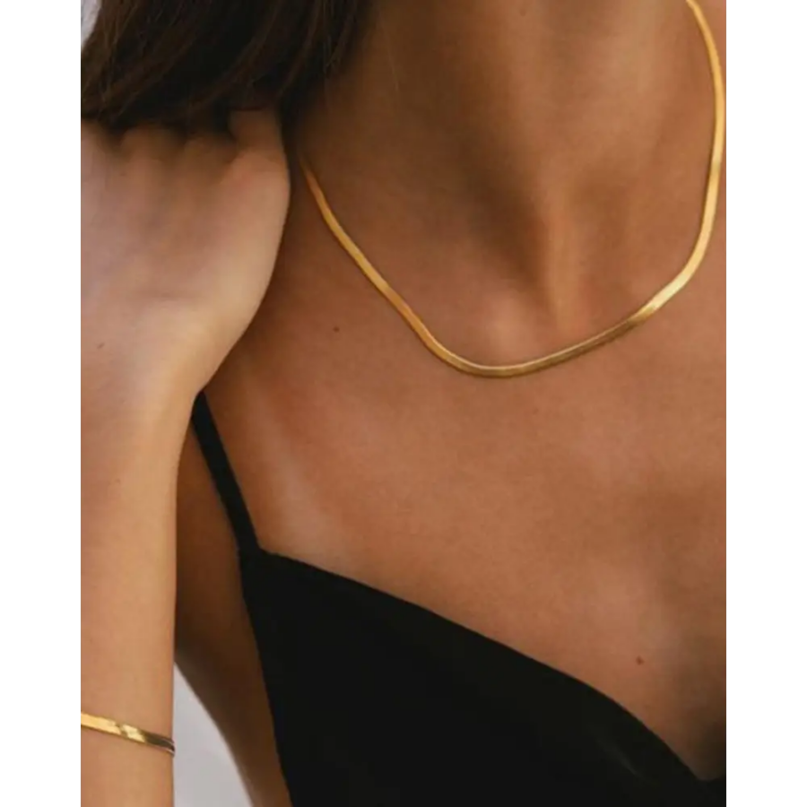 Adjustable stainless steel chain necklace worn close to skin, 16-18 inch length