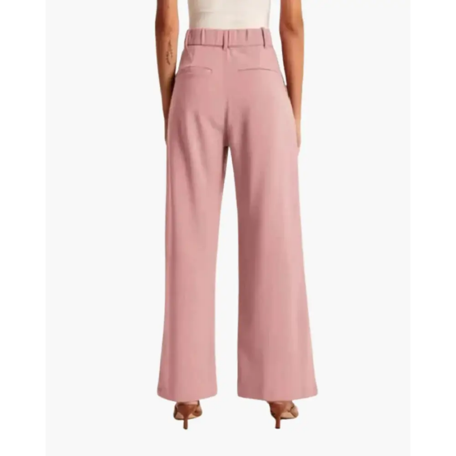 Fluid tailored trousers, fabric texture and weave close-up