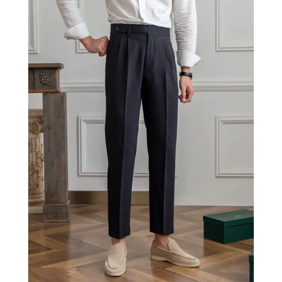 Black high waist tailored trousers, straight leg silhouette, three-quarter front view