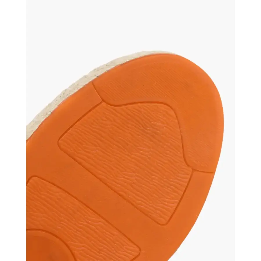 Detail shot of minimalist canvas espadrille stitching and construction