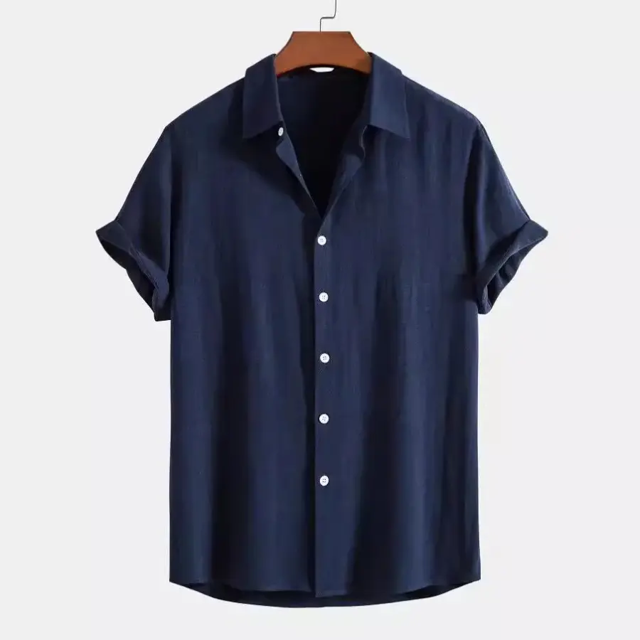 Full navy linen shirt with cream relaxed-fit trousers, styled together, showing drape and proportion