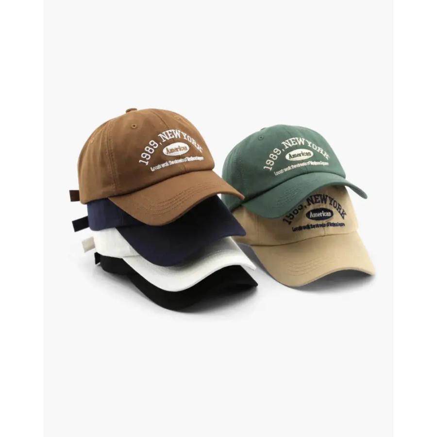 Cotton baseball cap in neutral color, front view with adjustable strap