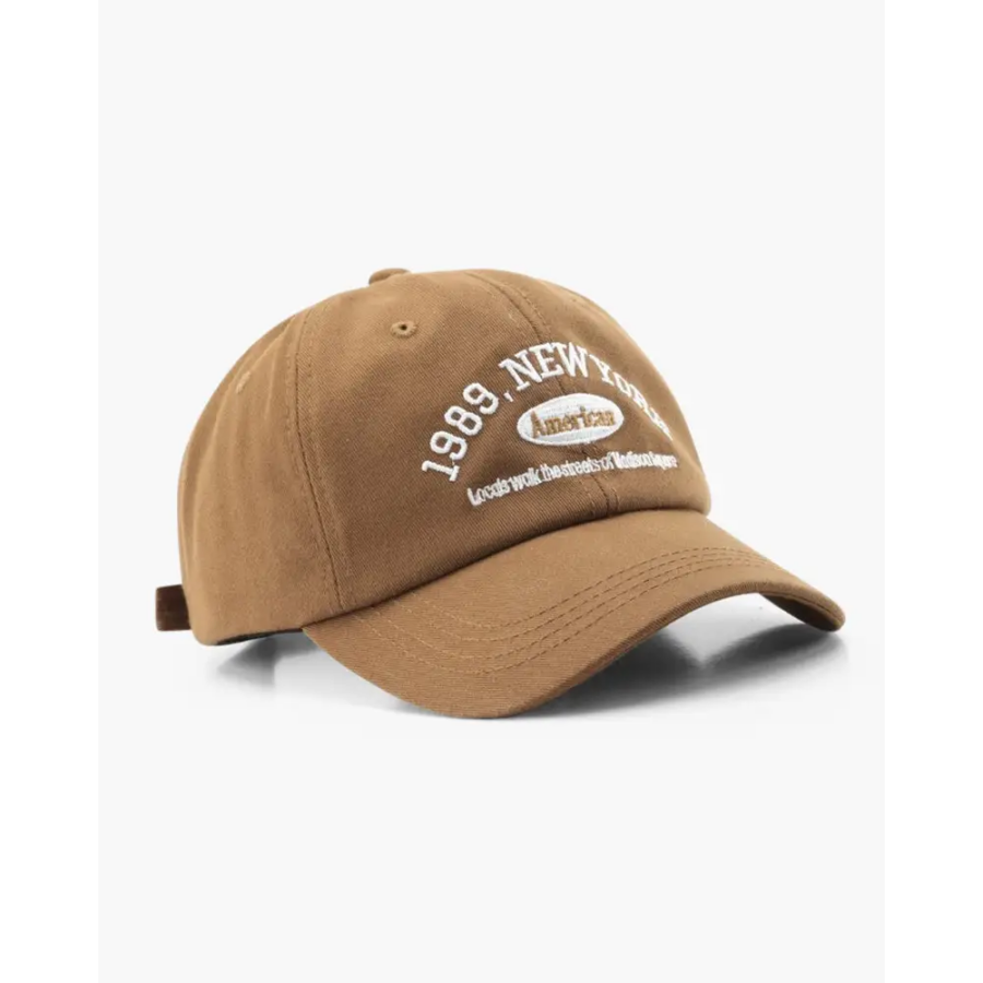 Brown cotton twill baseball cap, side profile showing bill structure