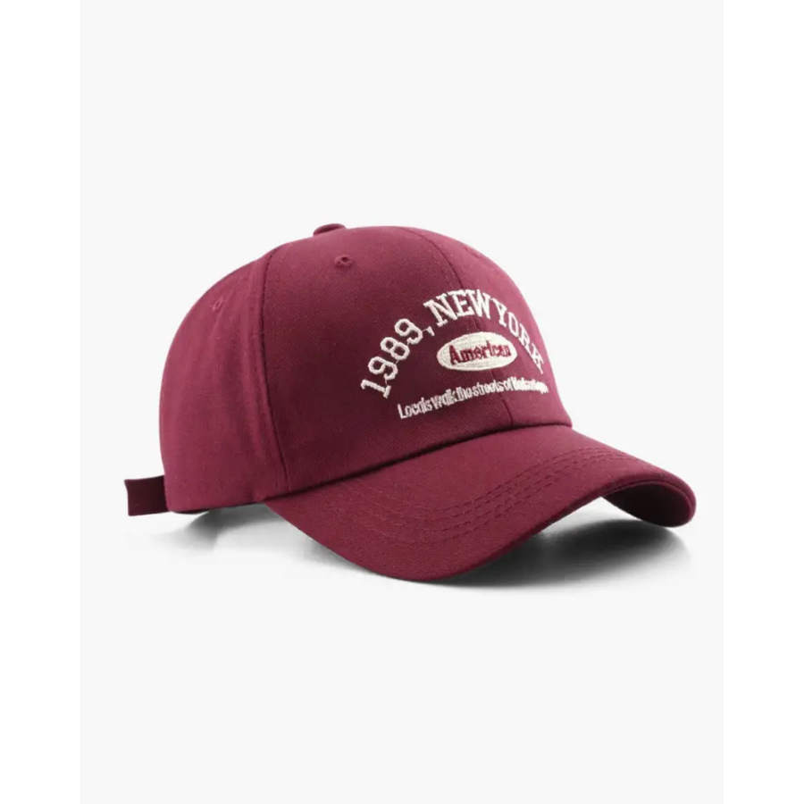 Red cotton baseball cap, front and side view showing color depth