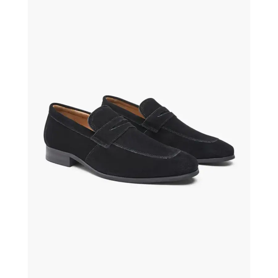 Black suede loafer, side profile detail of hand-finished calf leather and leather sole