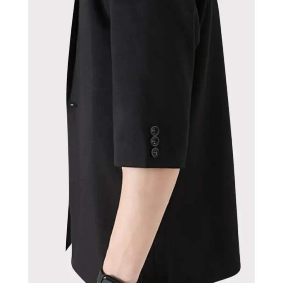 Black smart casual blazer and pants set, tailored silhouette, side angle