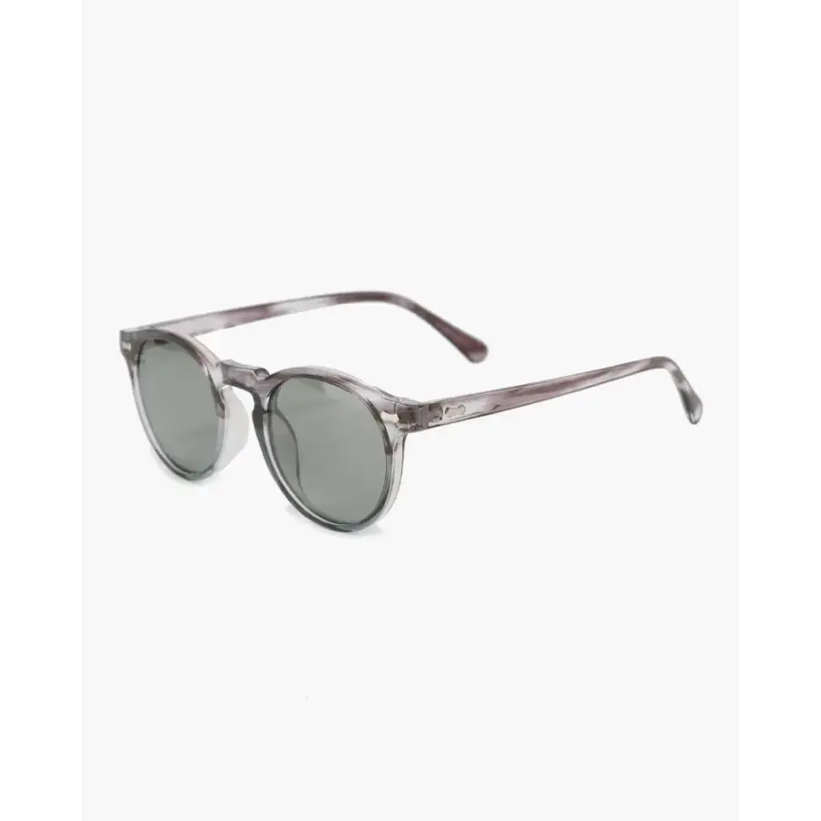 Montelaire polarized sunglasses worn outdoors, natural daylight, grey lens