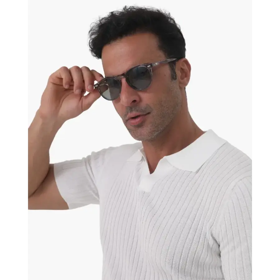 Polarized UV sunglasses grey colorway worn on model, side angle