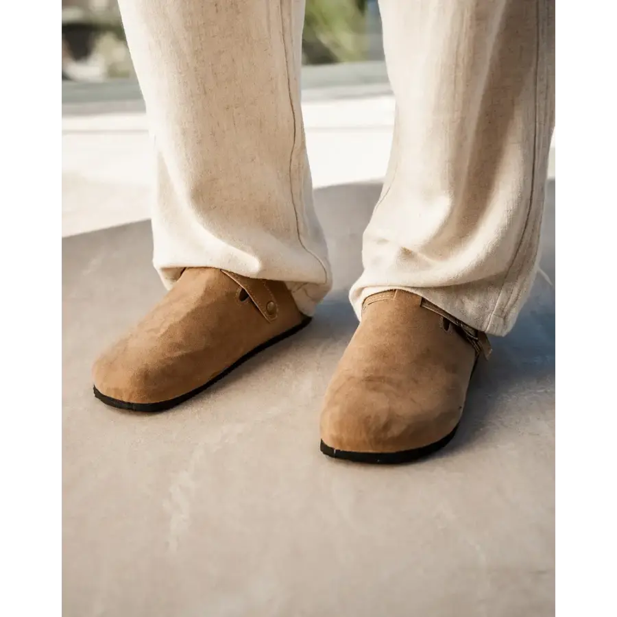 Soft suede clog worn on foot, demonstrating fit and comfort