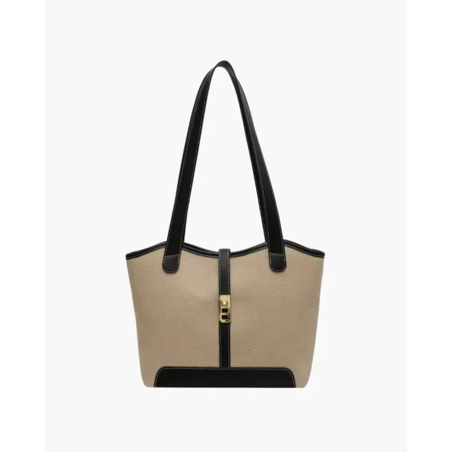 Canvas shoulder bag interior showing two slip pockets and structured body