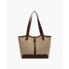 Refined canvas shoulder bag in brown, front view showing flap closure and brass turn-lock