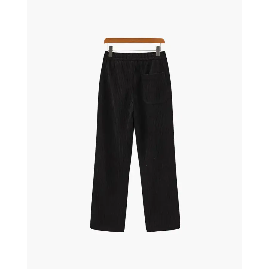 Corduroy trousers silhouette, full-length drape detail