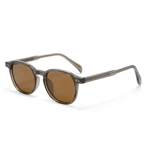Tea finish retro round sunglasses, close-up of frame detail and lens