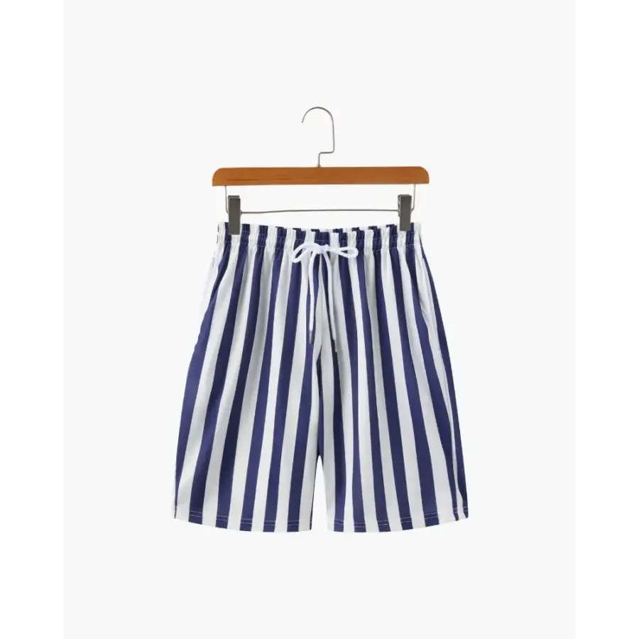 Riviera swim shorts in white, flat lay front view showing low-rise brief silhouette and elasticated waistband