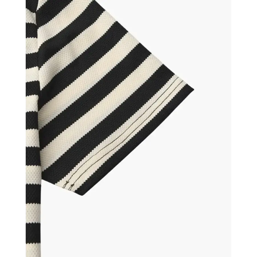 Textured stripe polo layered under lightweight cardigan