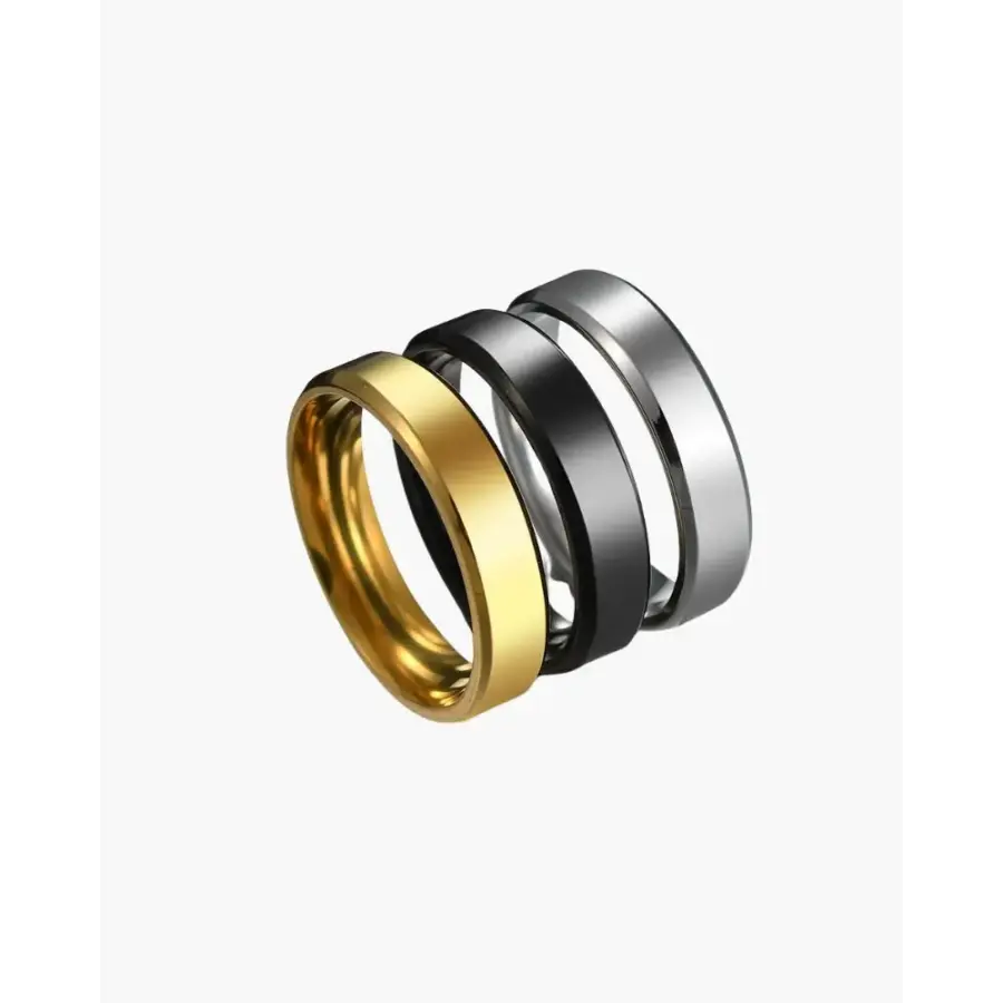 Signature Comfort Ring all three finishes: gold, silver, matte black stacked together