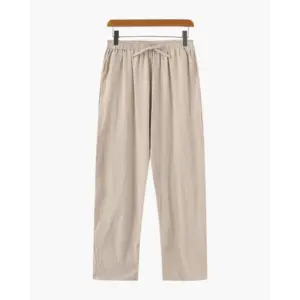 Signature beige linen pants, straight leg, folded to show natural fabric texture and weave