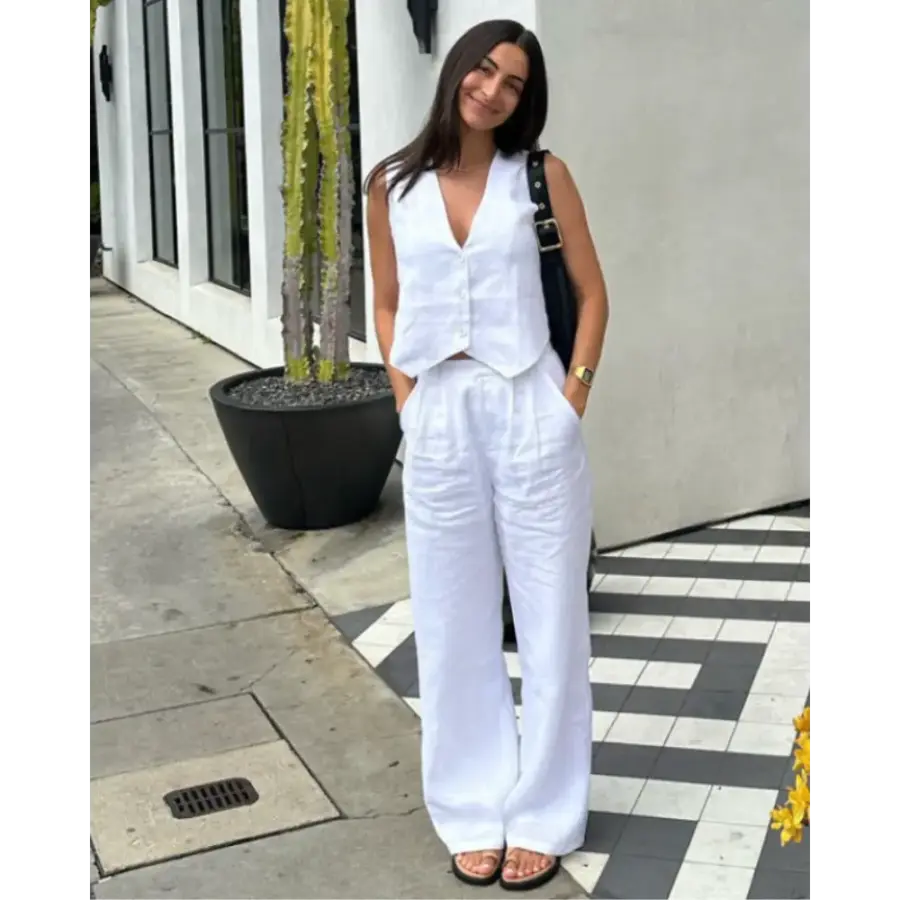 Linen-cotton blend jumpsuit flat lay showing drape and fabric texture