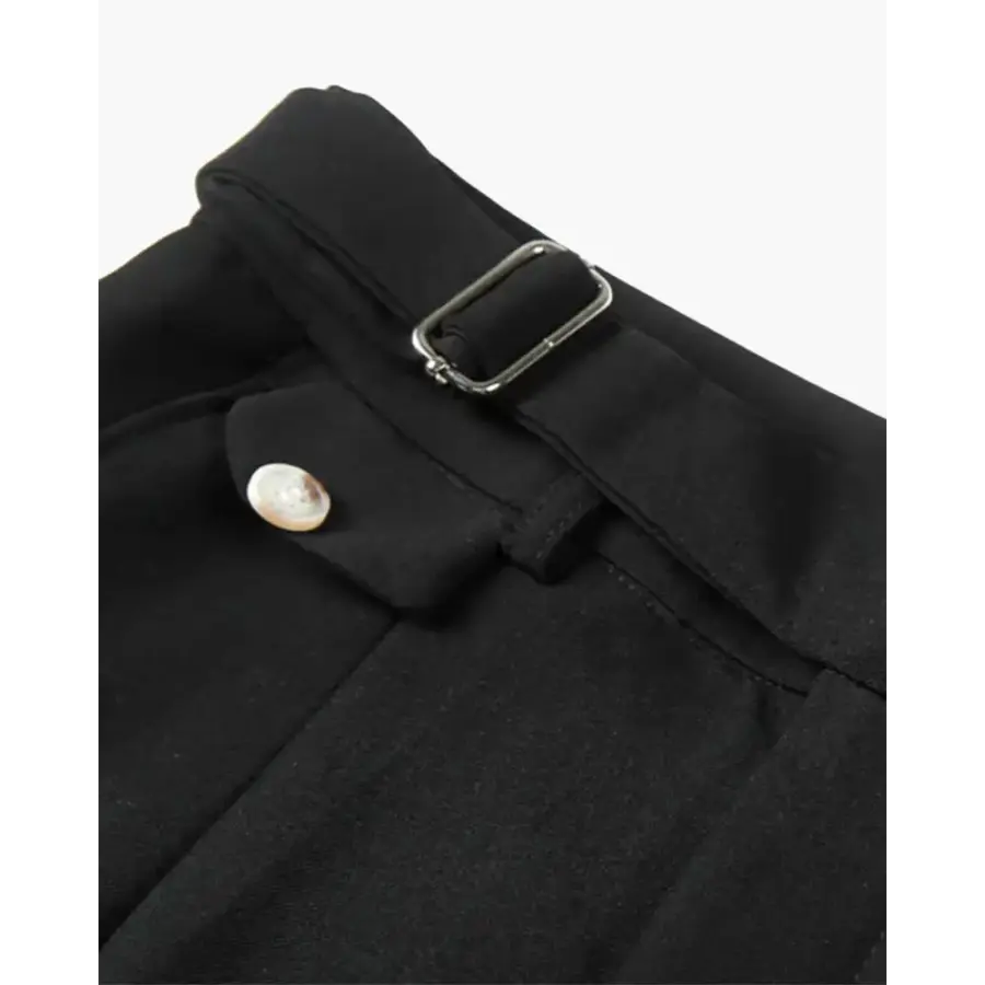 Tailored short pantalon worn, knee-length proportion with loafers