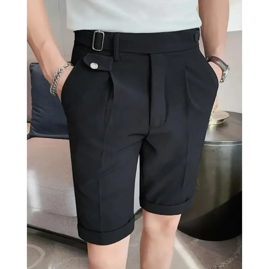 Black tailored shorts with angled pockets, detail of waistband and drawcord