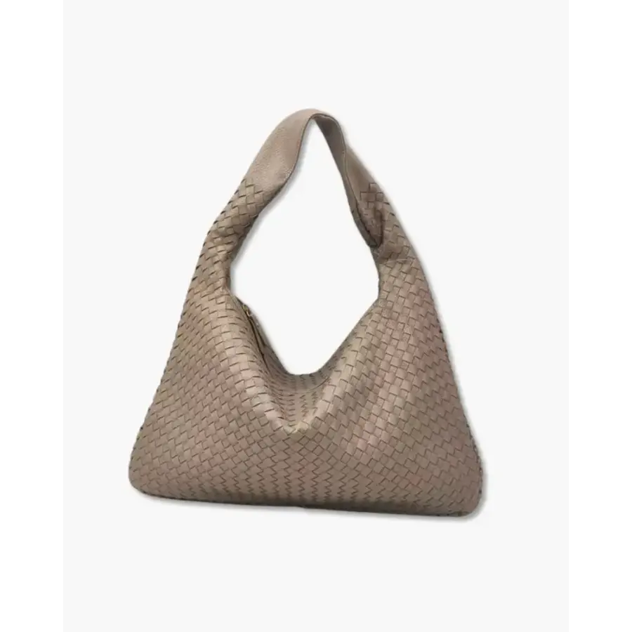 Sculpted Shoulder Bag in Beige, worn with laptop and daily essentials for scale