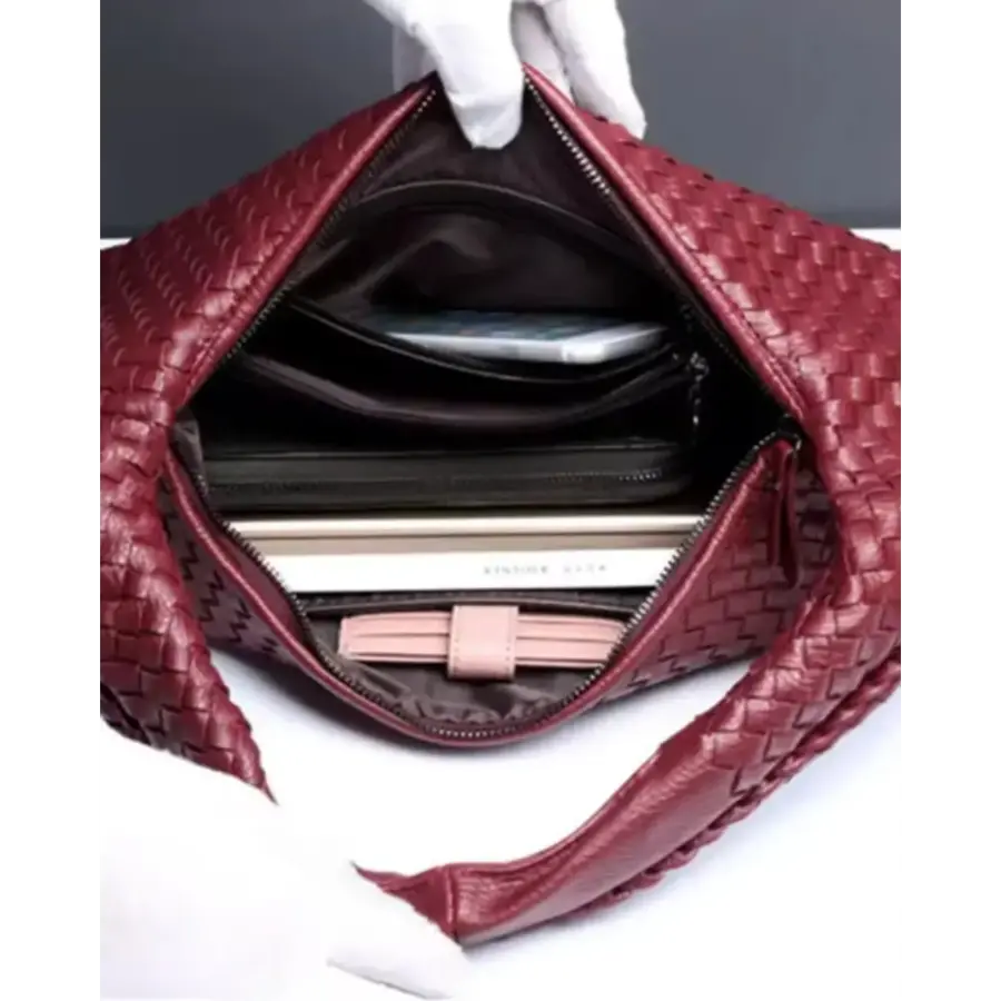 Sculpted Shoulder Bag in Bordeaux Red, showing color depth and canvas finish