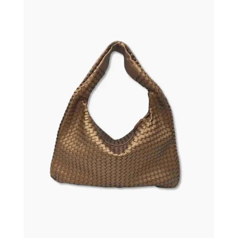 Sculpted Shoulder Bag in Brown, showing natural patina development over time
