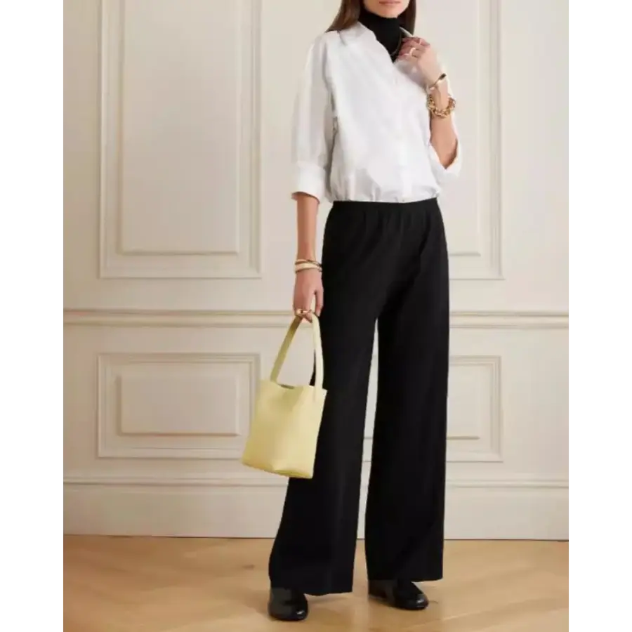 Palais trousers worn, demonstrating wide-leg silhouette and movement