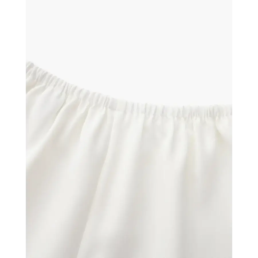 Side profile of Palais high-rise trousers, showing hip and waist fit
