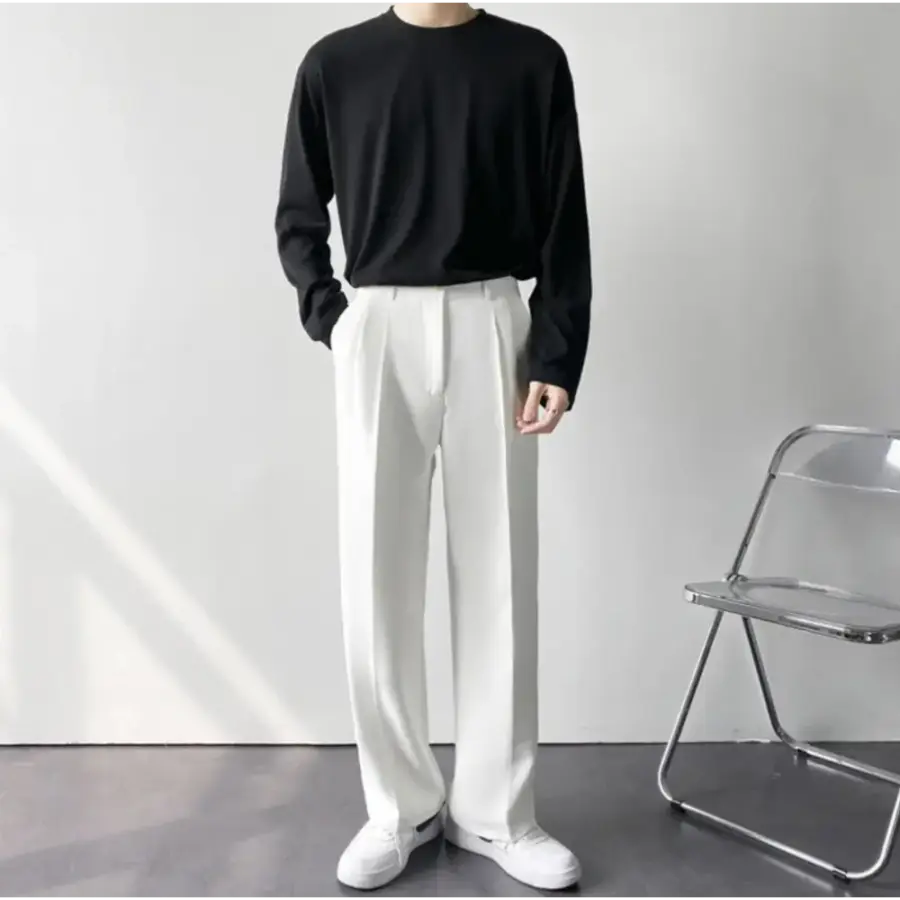 Relaxed trousers paired with linen shirt and loafer, styling detail