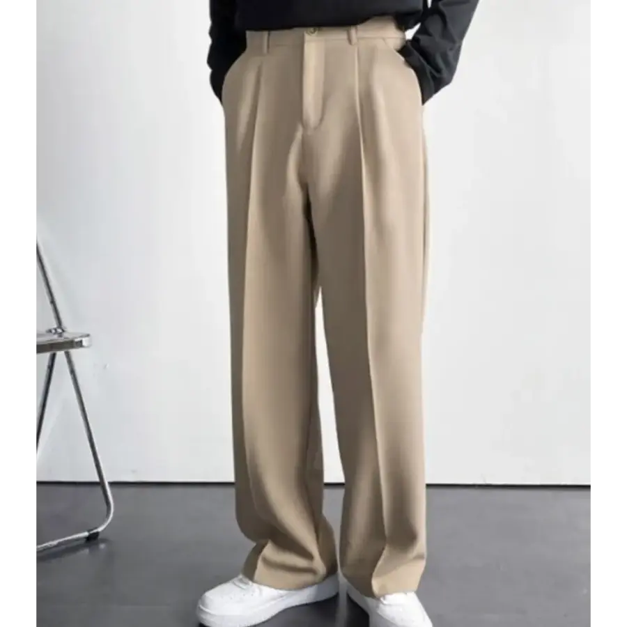 Relaxed trousers black and beige laid flat, color comparison